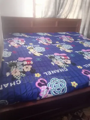 Mattress and Wooden Bed
