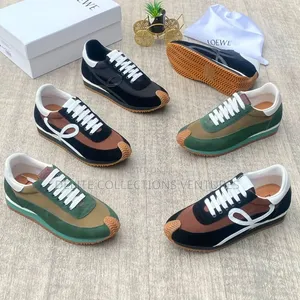 *Loewe Flow Runners With a Distinctive L-Shaped Monogram and a Waved