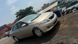 Toyota Corolla LE 4dr Sedan (1.8L 4 cyl 4A) 2009 Gold
