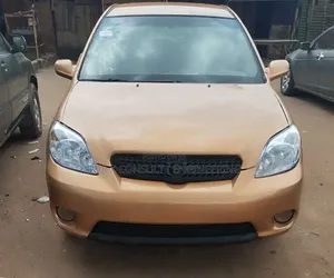 Toyota Matrix XR Hatchback FWD (1.8L 4cyl 4A) 2006 Gold