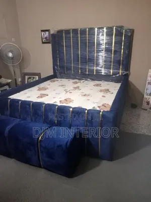 6x6 Padded Bedfram With bedOttoman and the Uprights Are 27inches Tall