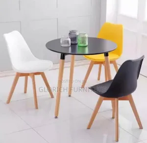 3-Seater Black Round Table Tulip Shell Chair Set