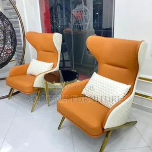 Pair of Two-Tone Wingback Accent Chairs – Tangerine Cream Quilted