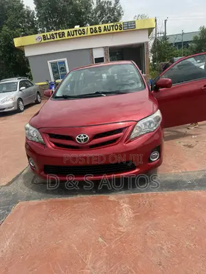 Toyota Corolla L 4dr Sedan (1.8L 4cyl 5M) 2013 Red