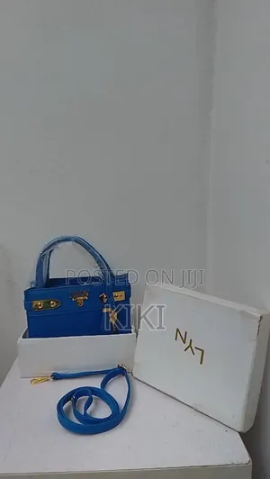 Elegant Royal Blue Luxury Handbag With Crossbody Strap