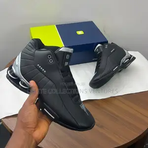 *Nike Shox Bb4 “Black Metallic Silver Colourway Sneakers*