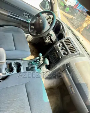 Nissan Frontier Automatic 2005 Orange