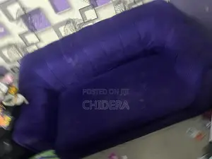 Clean 2-Seater Purple Fabric Sofa – Fairly Used
