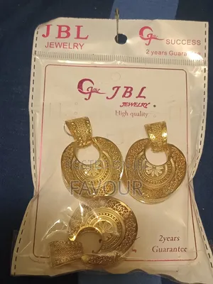 Three Piece Gold-Plated Earrings and Pendant Set