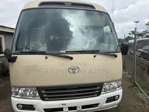 Toyota Coaster 2019 Gold