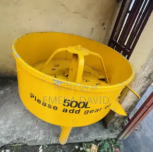 Pan Mixer Machine Used for Mixing Cement Aggregate and Water.