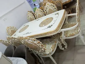 Royal Dining Table With 8 Fabric Chairs