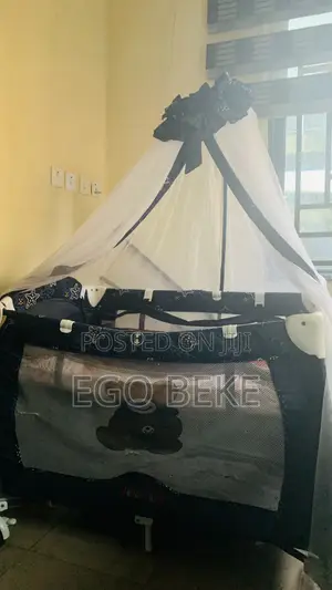 Adjustable Baby Cot