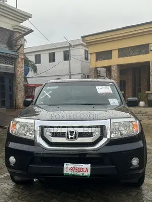 Honda Pilot Touring w/RES/Navi 4WD (3.5L 6cyl 5A) 2010 Black