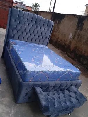 41⁄2by6 Upholstery Bedframe With Footrest and Mattress Available