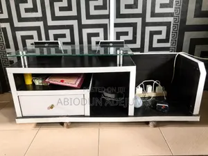Neatly Used TV Stand With Glass Top – Strong Durable