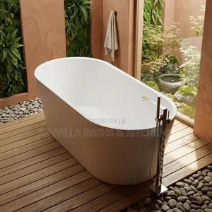 Modern Freestanding Soaking Tub With Floor-Mount Faucet