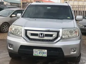 Honda Pilot Touring 4dr SUV 4WD (3.5L 6cyl 5A) 2009 Silver