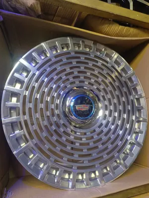22ich Cadillac Chrome Wire Wheel Cover Featuring a Prominent Center