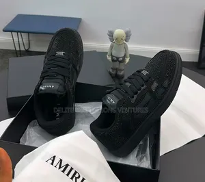 *Amiri Skeleton Low Top Sneakers
