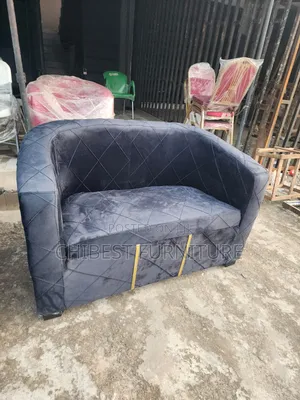 Grey Double Seater Padded Sofa Chair.