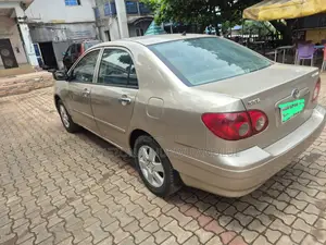 Toyota Corolla Base 4dr Sedan (1.8L 4cyl 5M) 2010 Red