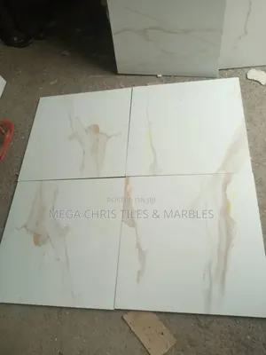 60x60 Carara Gold , Spanish.
