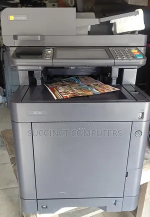 Uk Used Kyocera 3 in 1 Coloured Printer. (Prints, Scans, Photocopy)