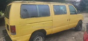 Ford E250 2001 Yellow