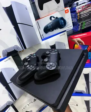Neatly Used Playstation 4 With 10 Games and Fifa26 and Pes