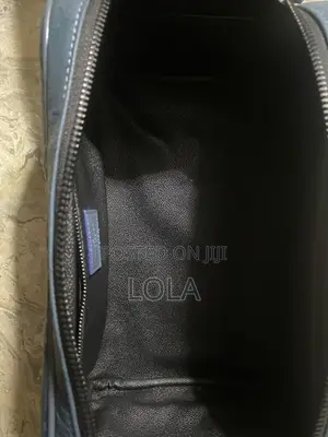Louis Vuitton Monogram Shadow Dopp Kit