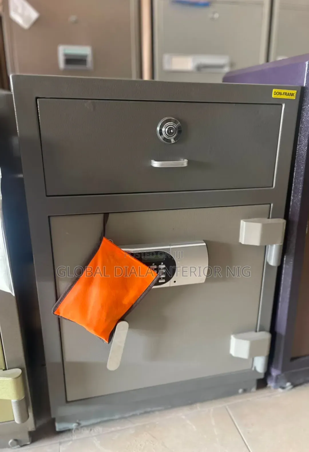 Don-Frank Branded Fireproof Safe Featuring a Gray Steel Construction.