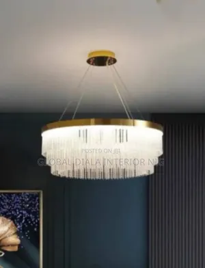 Modern Gold-Plated Crystal Chandelier Features Tiered Dropping Strands