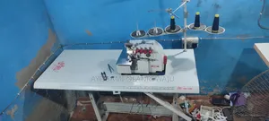 Two Lion 5 Thread Industrial Weaving Machine
