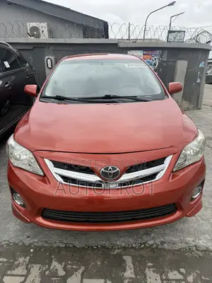 Toyota Corolla LE 4dr Sedan (1.8L 4cyl 4A) 2013 Orange