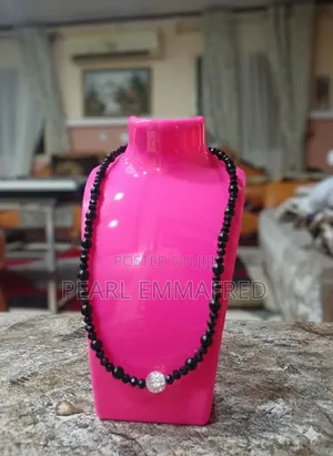 Black Beaded Necklace With White Stone
