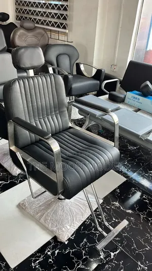 Barber Chairs With Silver and Gold Leg and Base