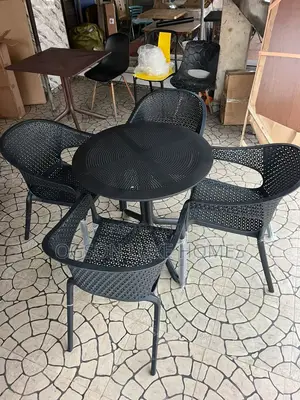 Weather Resistant Outdoor Table With Four Seaters