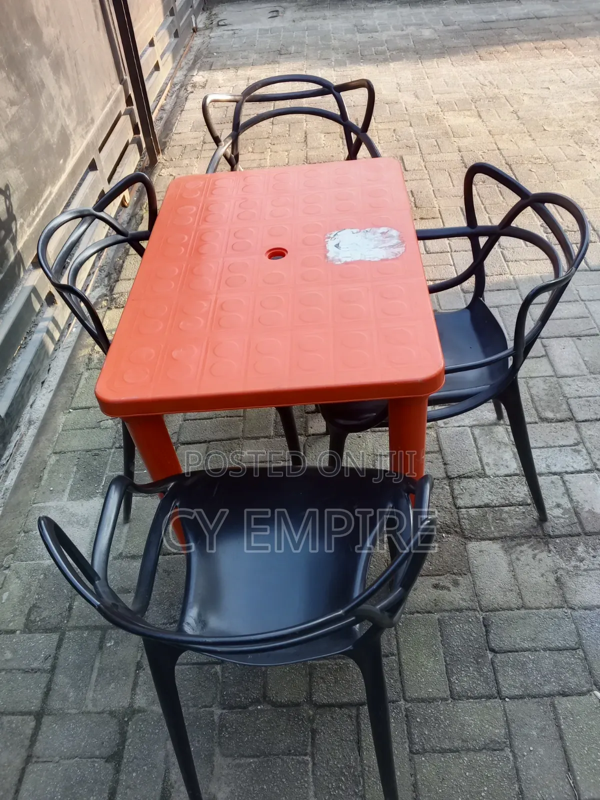 4 Plastic Chairs and 1 Table