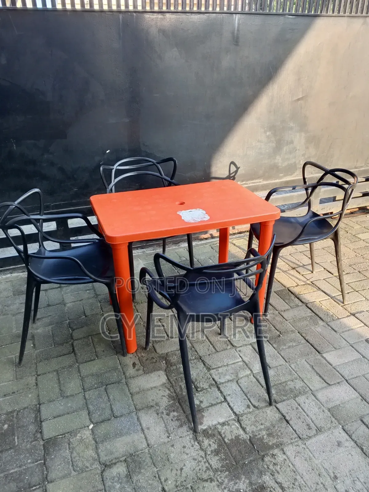 4 Plastic Chairs and 1 Table