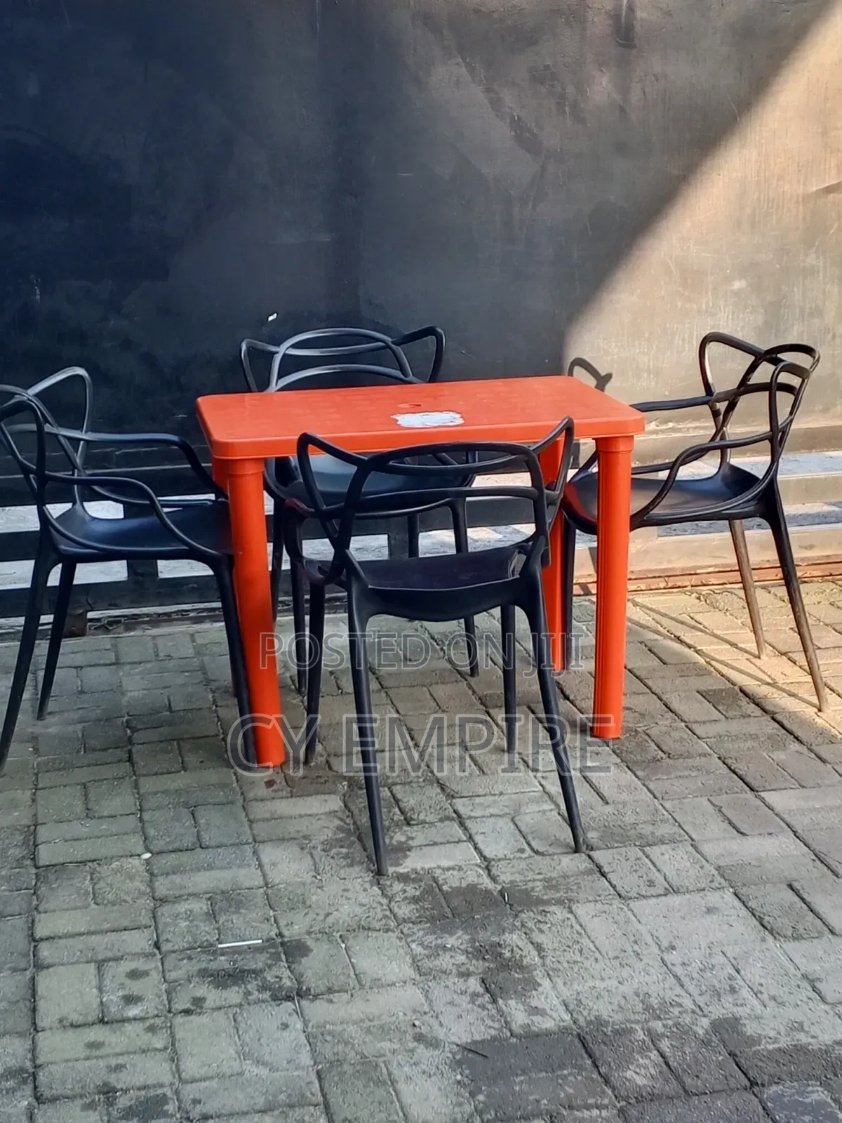 4 Plastic Chairs and 1 Table