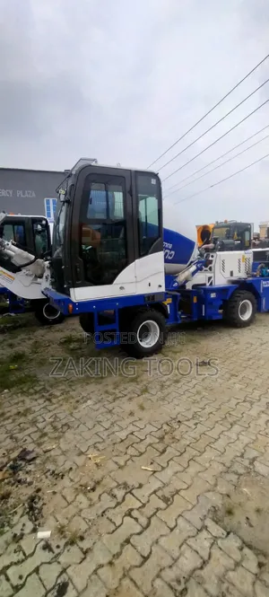 Self-Loading Concrete Mixer Machine