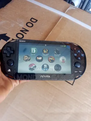 Sony Ps Vita Handle Game With Games Inside