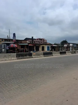 5 Bedroom Bungalow With BQ and 21 Shops Along Ago Palace Major Road