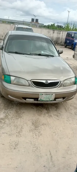 Mazda 626 1998 Gold