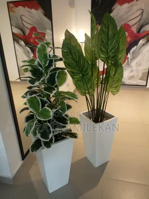 Artificial Plant in White Tower Vase Indoor