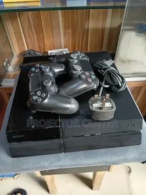 PS4 Fat With 2Pads and 10Games