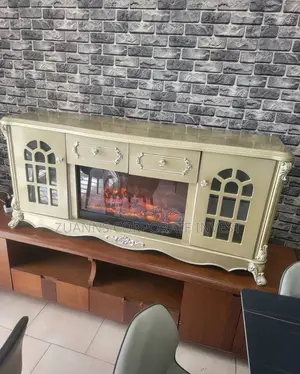 Royal Gold Television Stand With Electric Fireplace.
