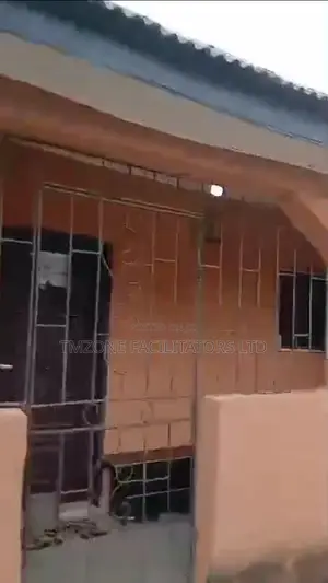 Full Plot of Land With 12 Mini Flats