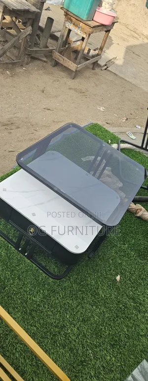 A Beautiful Luxury Adjustable Marble and Glass Table